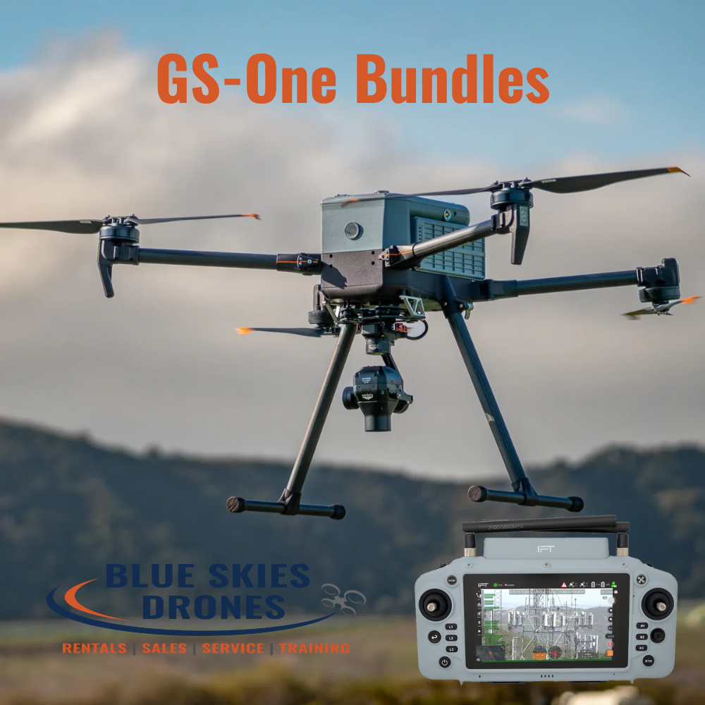 Drone with camera and controller against a mountainous background, featuring 'Blue Skies Drones' branding.