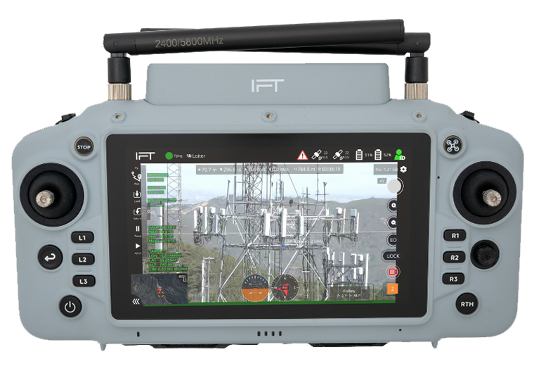 Gray handheld device with screen displaying a power plant layout on a white background